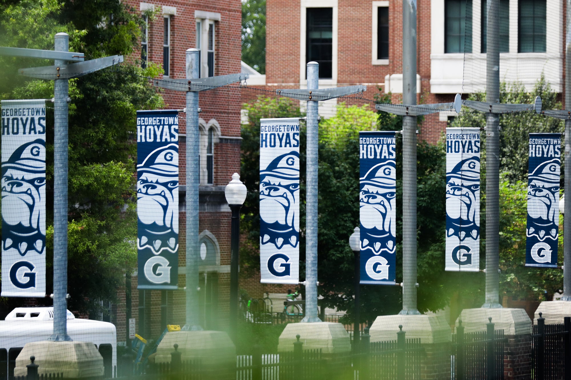 Banners with Georgetown logos line the side of Cooper Field.
