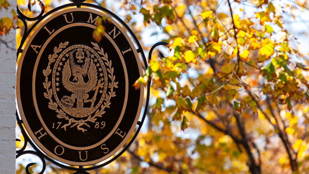 A sign with the Georgetown seal and reading 