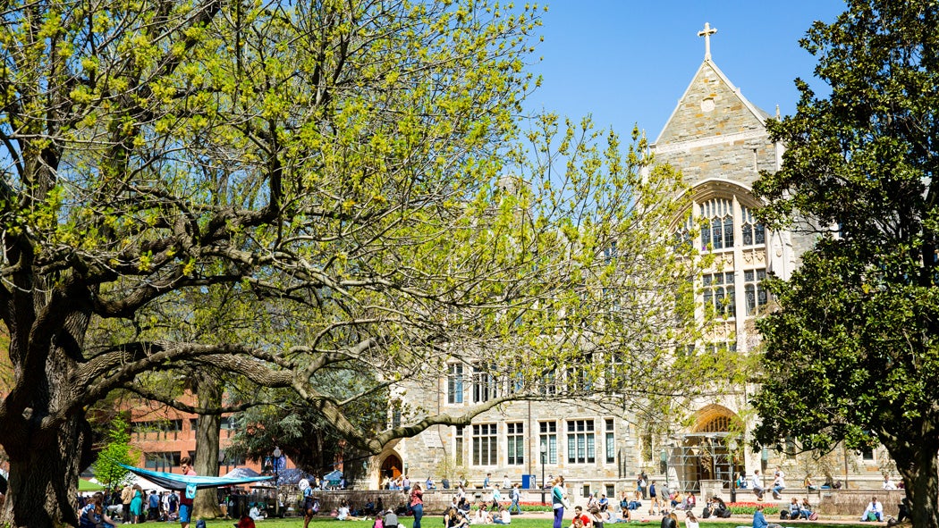 Students gather on Copley Lawn in front of White-Gravenor Hall.