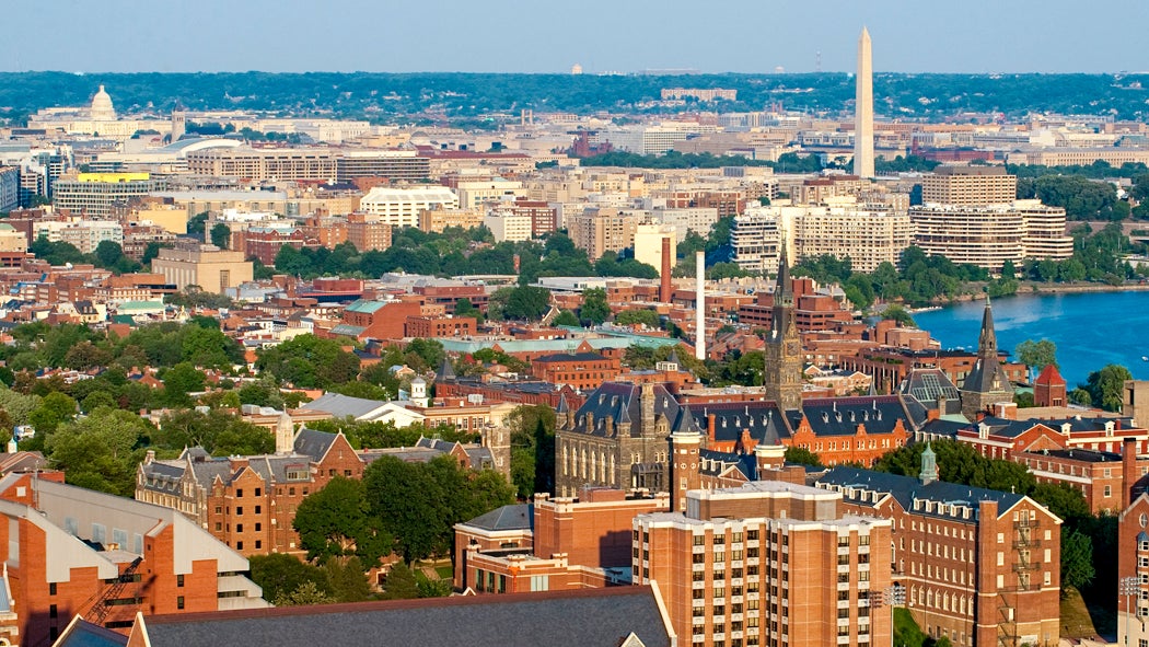 An aerial view of Washington, DC from above the campus of Georgetown University.