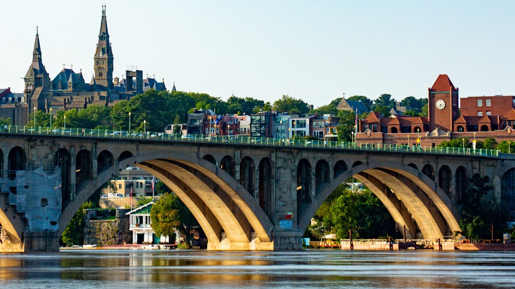 Georgetown's campus is visible above the Key Bridge in an image taken from the Potomac River.